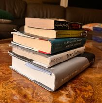 Books sitting on a counter