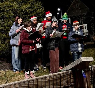 Carolers Sing at the Tree Lighting