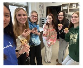 UHS Food Club Members testing cookies for the bake sale