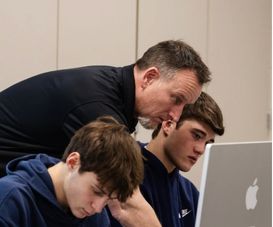 Mr. Starkey, part of the Business Department, teaching students in his AP Computer Science Class