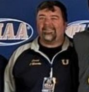 Coach O’Rourke as coach of the tennis team