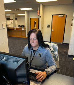 Mrs. Press at a computer